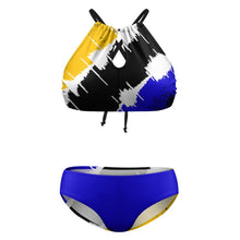 Load image into Gallery viewer, Two-piece bikini set with an abstract paint-splatter design in yellow, black, white, and blue, shown on a plain white background.